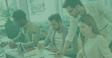 Group of people collaborating in an office setting