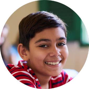 A young boy smiling